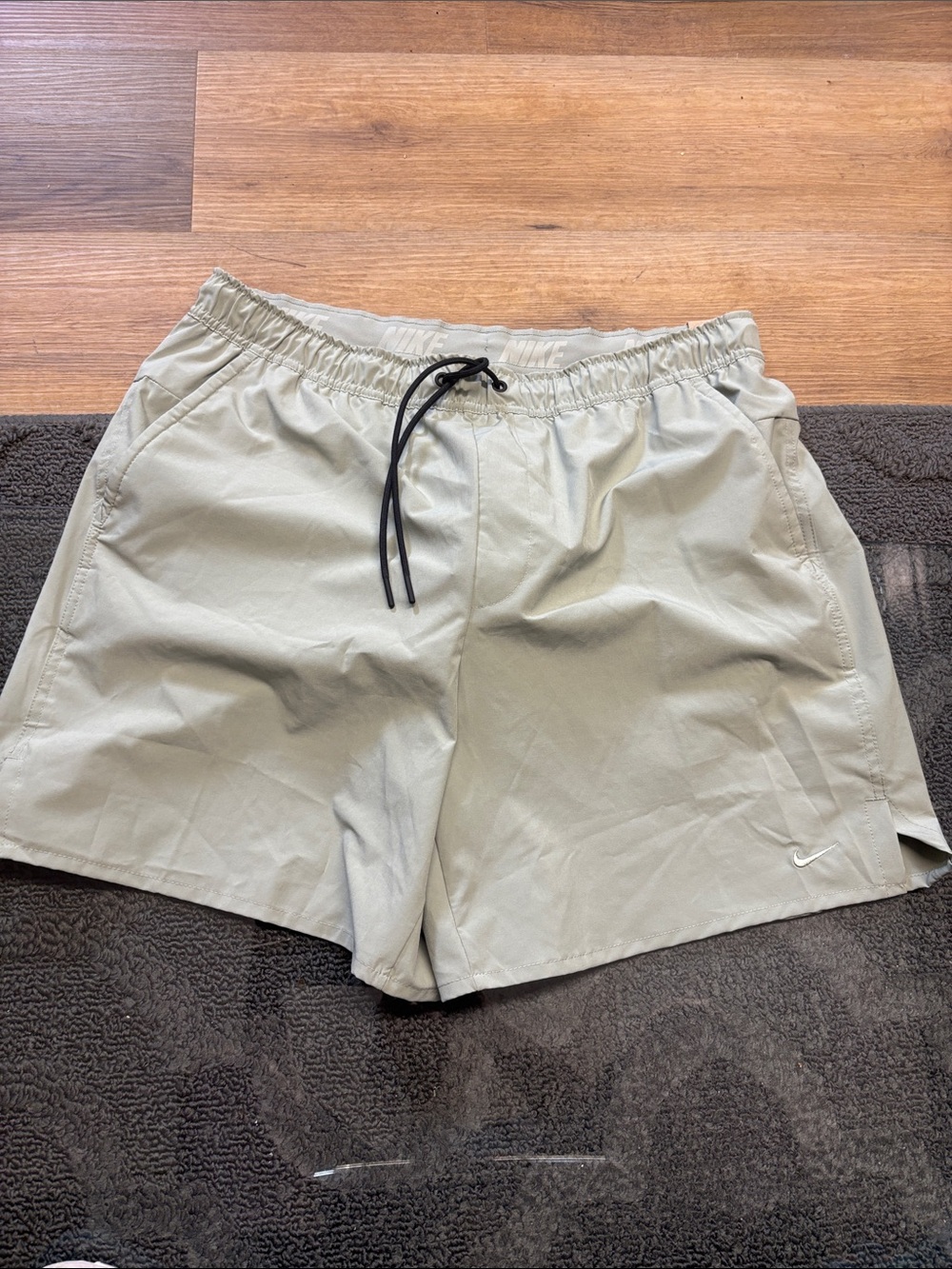 Nike Men's Sage Green Athletic Shorts with Black Drawstring